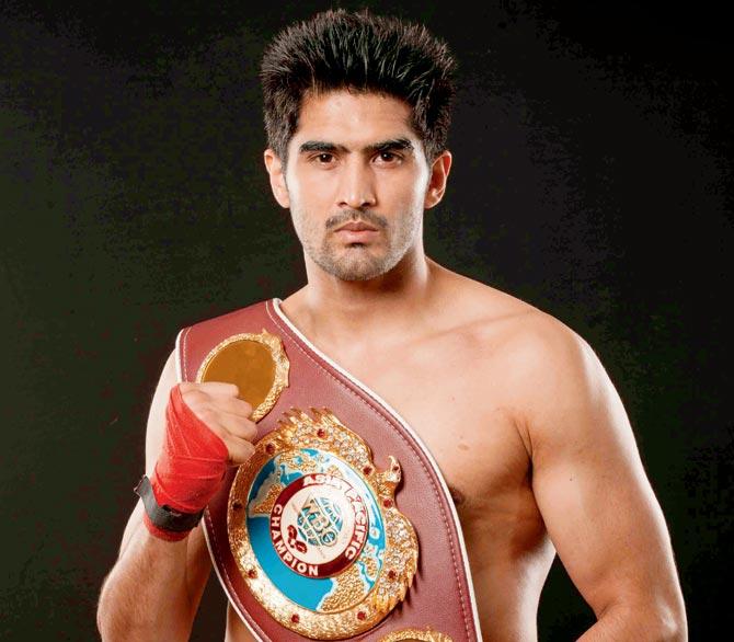  Vijender Singh with the WBO Asia Pacific Super Middleweight belt