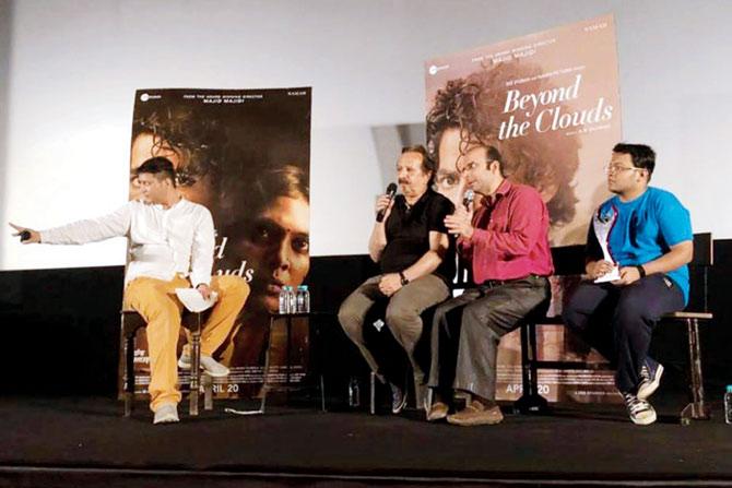 Majid Majidi (in black) during a discussion at the theatre 