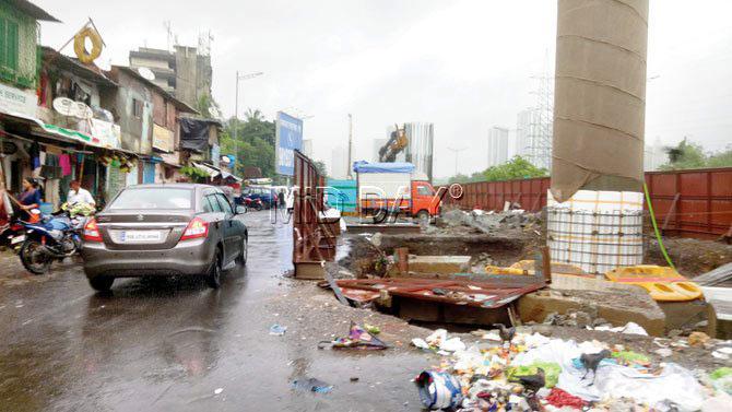 An open pit on the Western Express Highway stretch between Andheri East and Dahisar