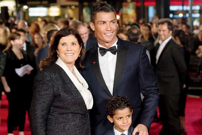 Ronaldo with his mother Dolores and son Cristiano Jr