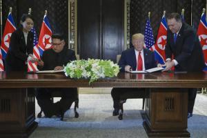 Donald Trump, Kim Jong-un sign 'comprehensive document' after historic summit