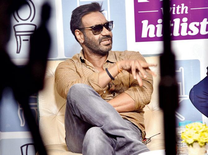 Ajay Devgn in conversation with Mayank Shekhar at the latest edition of Sit with HITLIST, at the mid-day office. Pics/Pradeep Dhivar