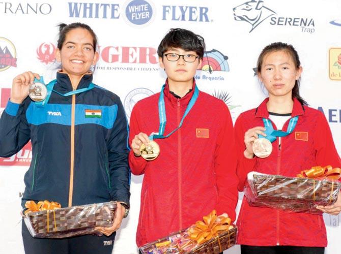 Anjum Moudgil (left) poses with her silver medal alongside China’s Ruijiao Pei (gold medallist) and Ting Sun (bronze winner) in the women’s 50m Rifle 3 Position event at the ISSF World Cup on Thursday