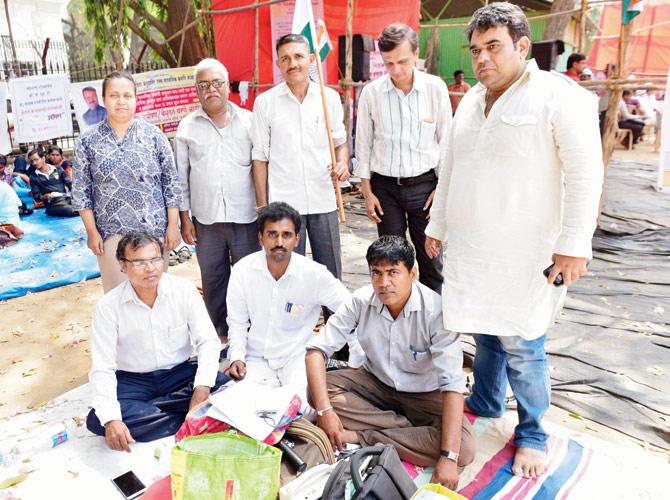 Bhushan Malgaonkar (sitting centre) with supporters and friends at Azad Maidan