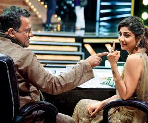 Who is Shilpa Shetty giving the finger to?