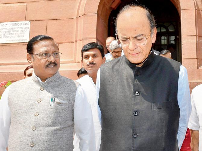 Union Finance Minister Arun Jaitley comes out of Parliament House during Budget Session. Pic/PTI