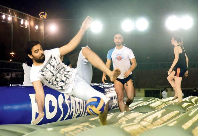 Indian Bossaball players Asif Khan (left) and Vinayak Upadhyay
