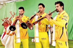 Mahendra Singh Dhoni, Suresh Raina and Ravindra Jadeja play the shehnai