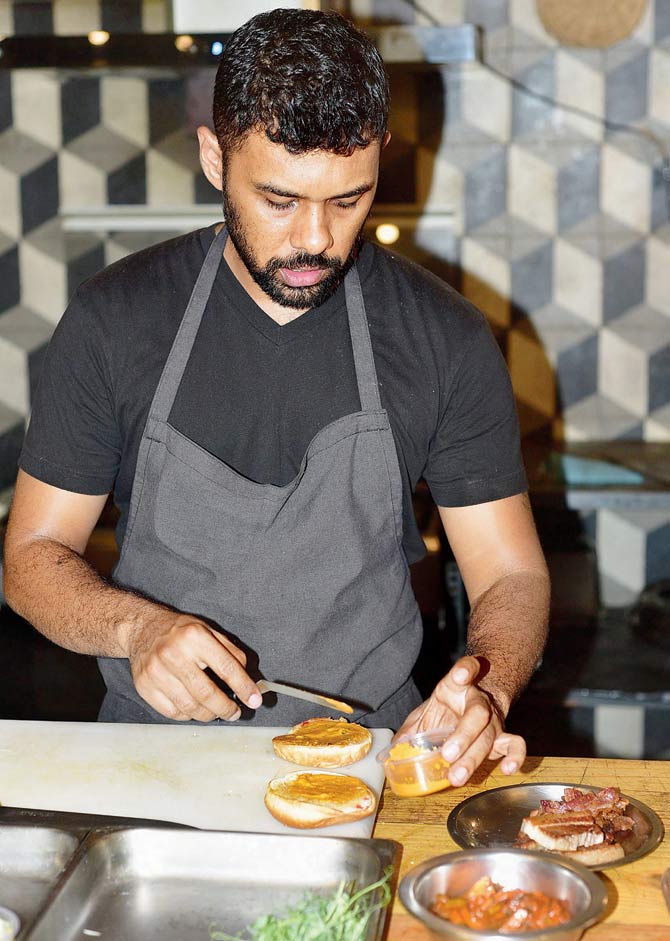 Chef Gresham Fernandes making burgers with the kimchi.âu00c2u0080u00c2u0088Pics/Bipin Kokate