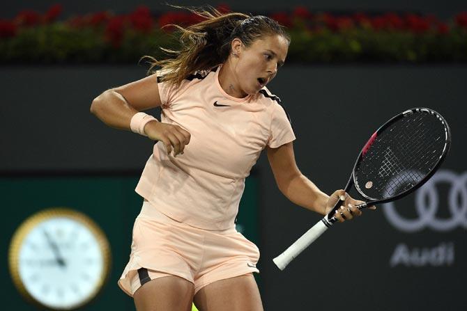 Daria Kasatkina of Russia celebrates after winning the second set of her semifinals match against Venus Williams of United States during Day 12 of BNP Paribas Open on March 16, 2018 in Indian Wells, California. Kevork Djansezian/Getty Images/AFP