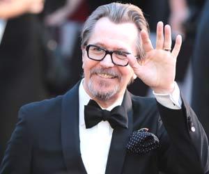 Gary Oldman's son defends him against abuse allegations