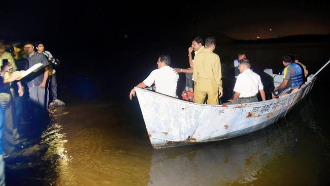 Officials from BMC and fire brigade search for the body of Arbaz Khan