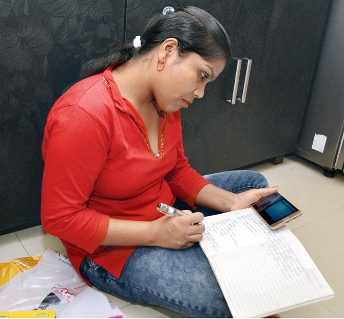 Poonam Vishwakarma, 28, who originally hails from Chhattisgarh, and works as a maid in Mumbai, has been attending classroom sessions for Std VI, on the app for the last four months