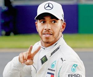 Formula One: Lewis Hamilton takes pole
