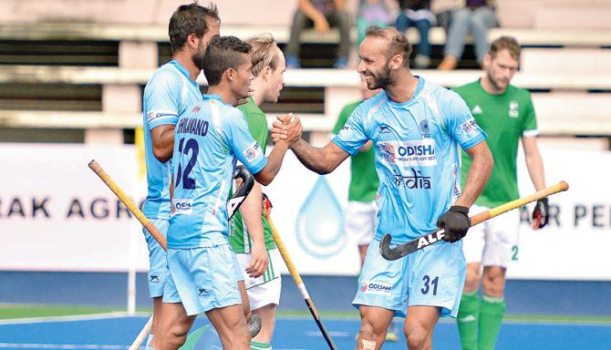 Indian players celebrate a goal against Ireland on Saturday