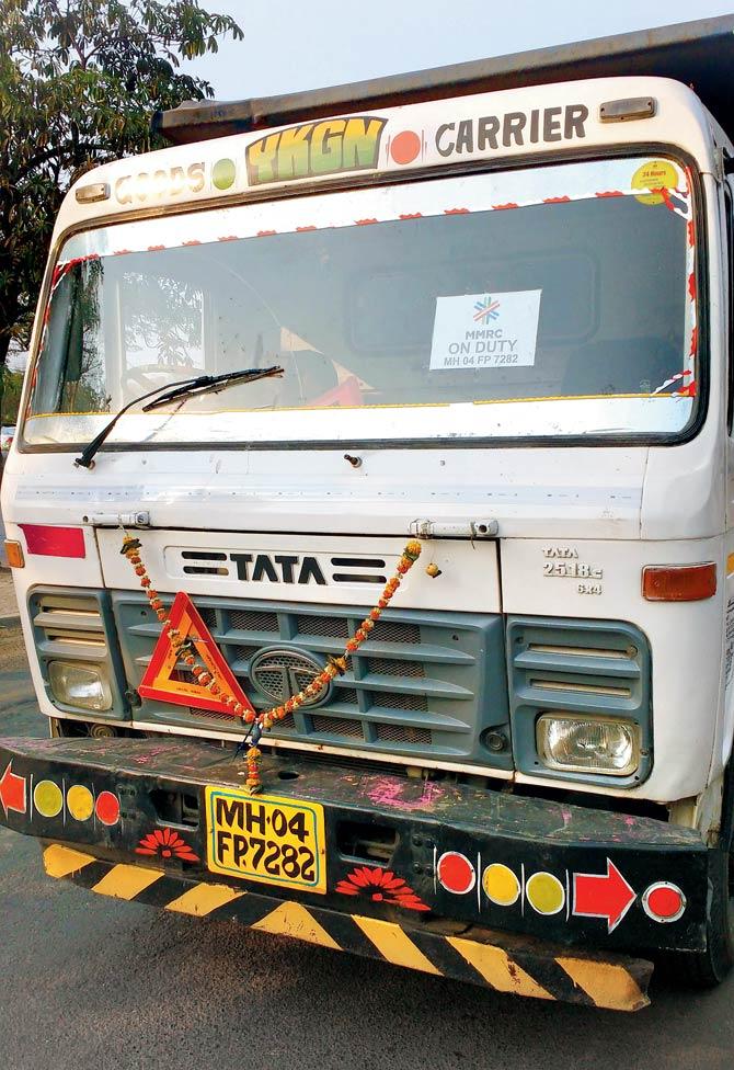 The dumping truck that had a MMRC on-duty sticker