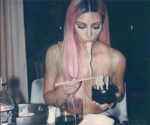 Kim Kardashian goes topless while eating ramen