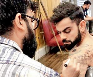 Virat Kohli visits Mumbai tattoo studio for consultations. See pics