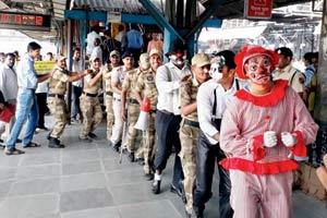 Mumbai: RPF cops dress as clowns to draw attention to their safety drive