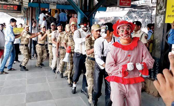 Kurla RPF policemen dressed as clowns during the safety initiative on Thursday. Pics/Rajesh Gupta