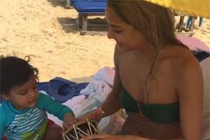 Lisa Haydon playing with son Zack at the beach is a sight to behold!