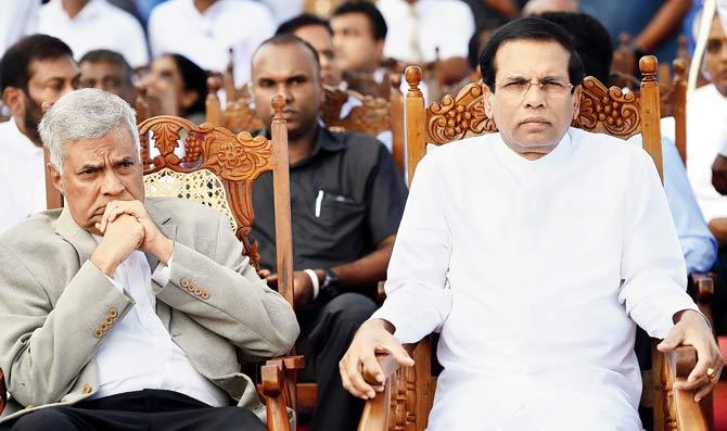 Sri Lankan President Maithripala Sirisena (right) and Prime Minister Ranil Wickremesinghe. Pics/AFP