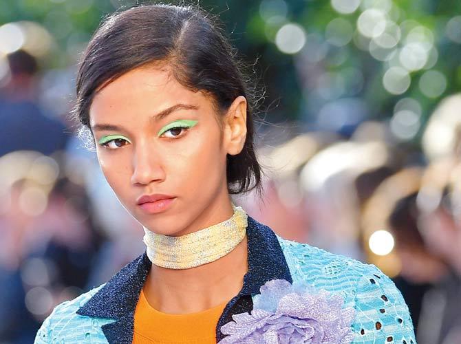 With the rest of the face bare, pick a minty shade for your eyes as seen at Missoni