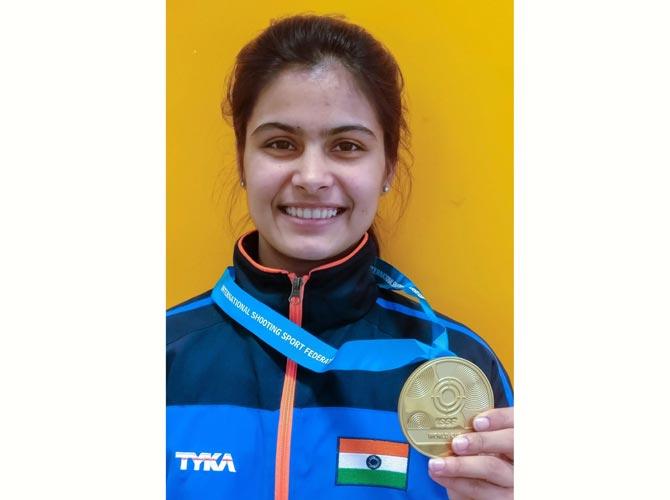 Indian shooter Manu Bhaker poses for photographs after winning gold in women’s 10m air pistol event, at International Shooting Sport Federation (ISSF) World Cup in Mexico’s Guadalajara on Sunday. Pic/ PTI 