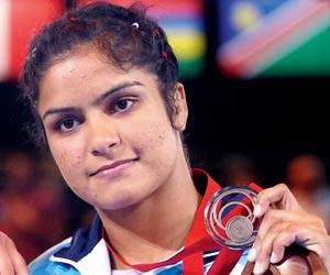 India's Navjot bags gold; Vinesh finishes with silver
