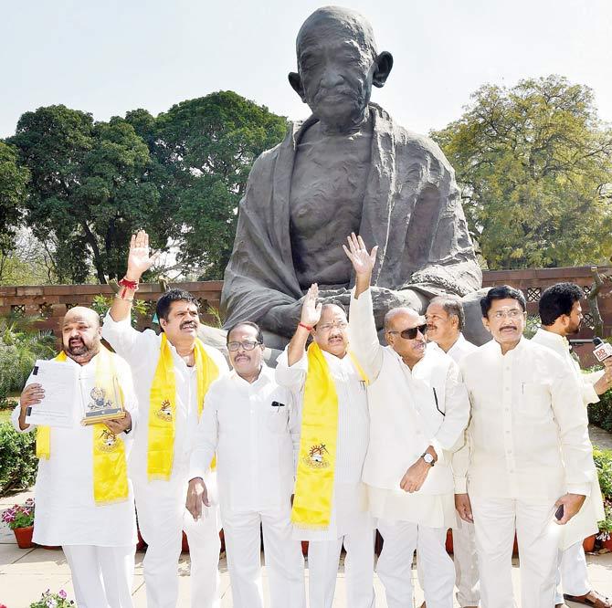 TDP MPs protest at Parliament House demanding special status for AP, on Tuesday. Pic/PTI