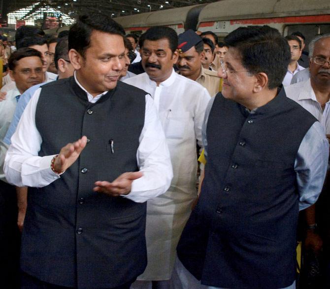 Railway Minister Piyush Goyal and Maharashtra Chief Minister Devendra Fadnavis during dedication of foot overbridges (FOBs), built by the Indian Army at Parel/ Elphinston Road, Curry Road and Ambivali, in Mumbai on Tuesday. Pic/PTI