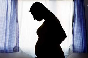 'When I told him I was pregnant, he punched me in the stomach'