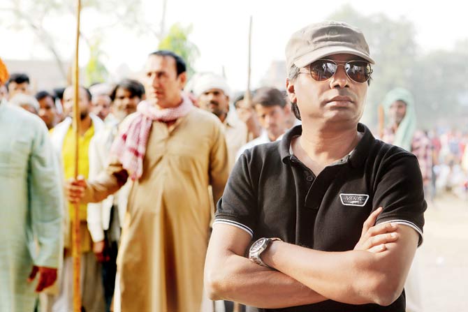 Rajkumar Gupta on the set of Raid