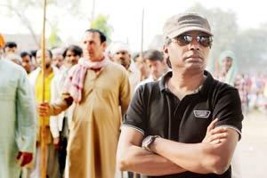 Raid director: My superheroes are real people, they don't fly