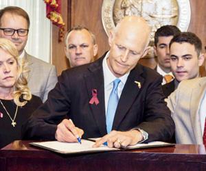 Florida Governor signs gun-safety bill into law