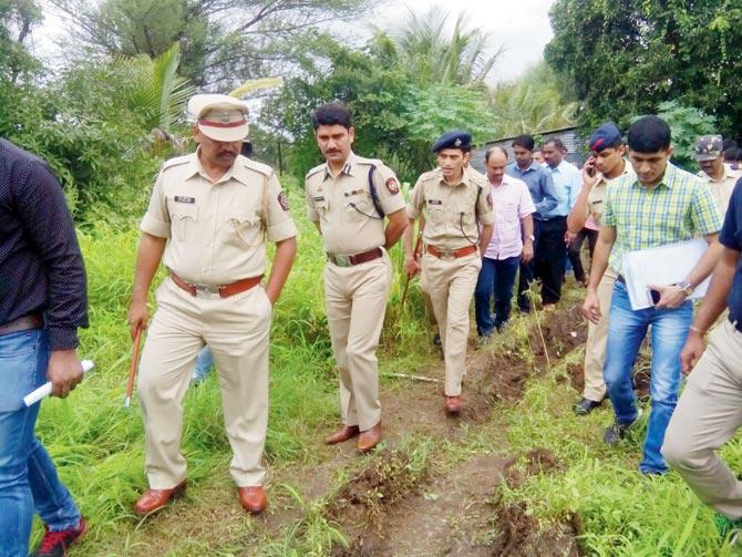 Police unearth skeletal remains of the victims of Dr Santosh Pol from his farm in Satara. File Pics