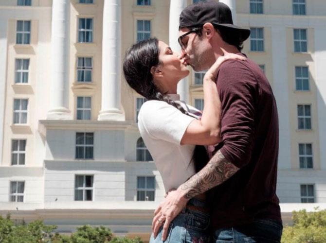 670px x 500px - Sunny Leone and Daniel Weber celebrate 10 years of togetherness with a  lip-lock