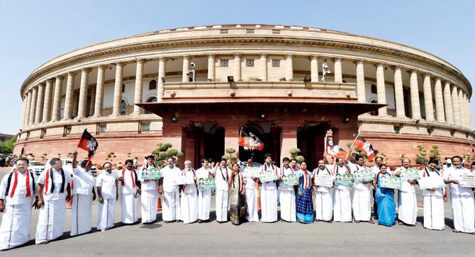 AIADMK MPs raise slogans demanding constitution of CMB during the budget session, at Parliament House in New Delhi, on Wednesday. Pic/PTI