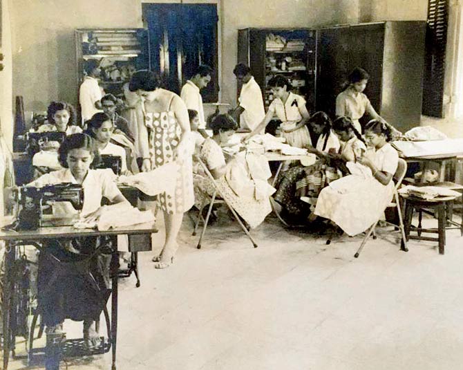 Zarine Khambatta supervising seamstresses in the sewing workshop of Butility Products, her store for embroidered baby clothes which counted royalty and movie idols among elite clients. Pic courtesy/Noshir Khambatta