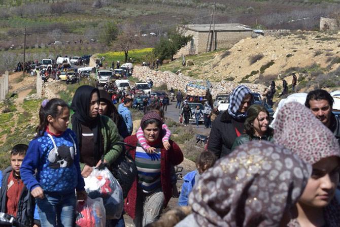 Civilians fleeing the city of Afrin