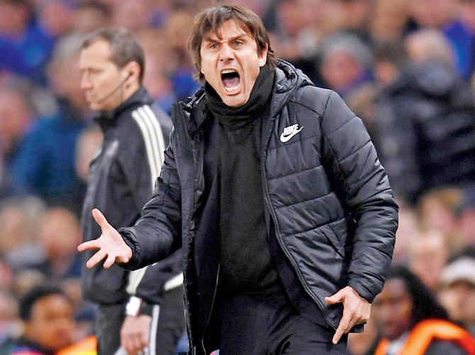 Chelsea boss Antonio Conte relays instructions during the Champions League Last-16 tie against Barcelona last month. Pic/Getty Images