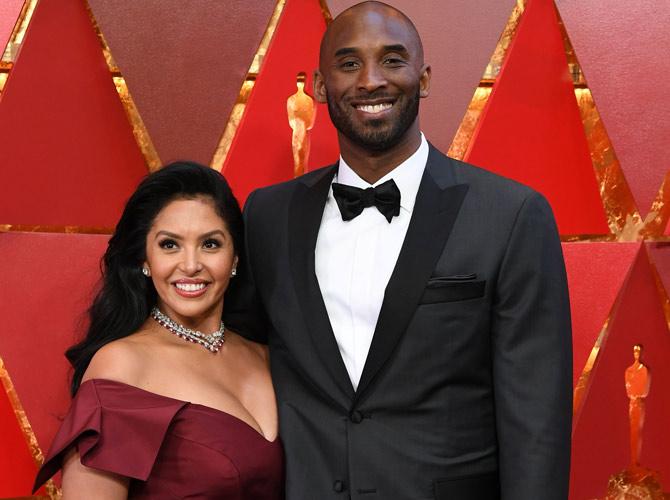 Kobe Bryant (R) and his wife Vanessa Laine Bryant