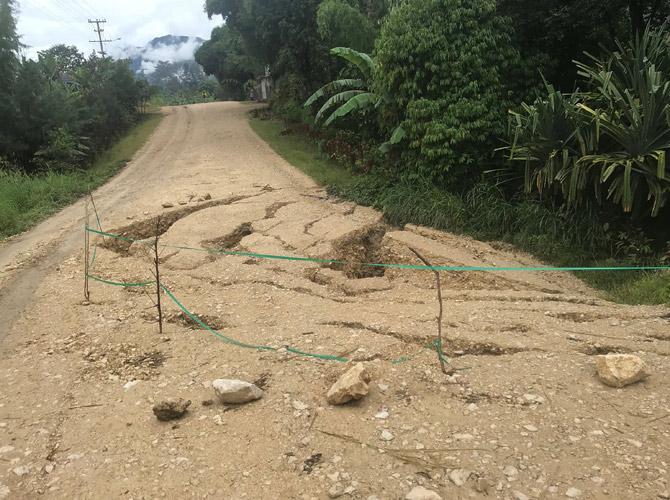 A handout photo taken on March 6, 2018 and received on March 7 from the International Federation of Red Cross shows earthquake damage in the Nipa-Kutuba district of the Southern Highlands in Papua New Guinea