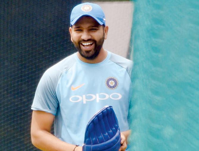 India skipper Rohit Sharma has a laugh during practice ahead of  the T20I against Sri Lanka in Colombo yesterday. Pic/AFP