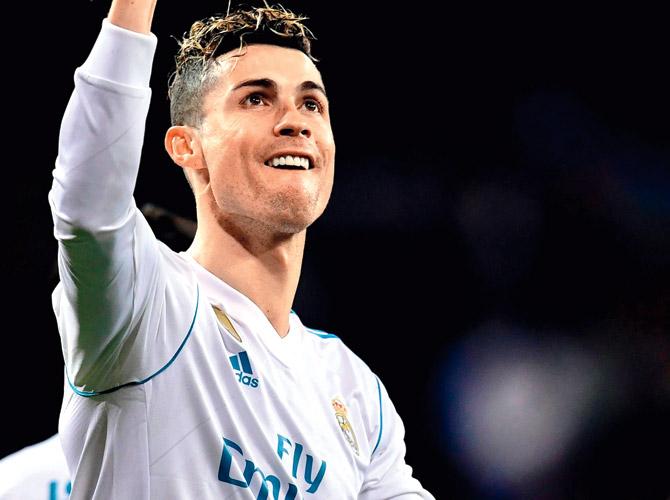 Real Madrid forward Cristiano Ronaldo celebrates his fourth goal against Girona during a La Liga match on Sunday. Pic/AFP