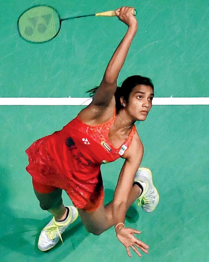 PV Sindhu returns to Akane Yamaguchi of Japan on Saturday. Pic/AFP