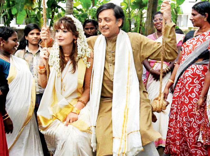 This photo taken on August 23, 2010, shows Congress MP Shashi Tharoor with his wife Sunanda Pushkar at Sree Chitra Poor Home after their wedding reception in Thiruvananthapuram. File Pic/PTI