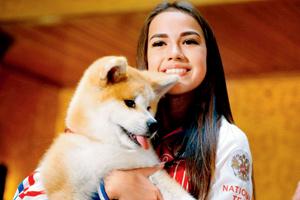 Akita society chief gifts champion skater Alina Zagitova a dog