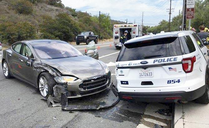 A Tesla driver died in first fatal crash while using Autopilot mode in May 7, 2016 when his Model S failed to distinguish a white tractor-trailer crossing the highway against a bright sky. Pic/Twitter