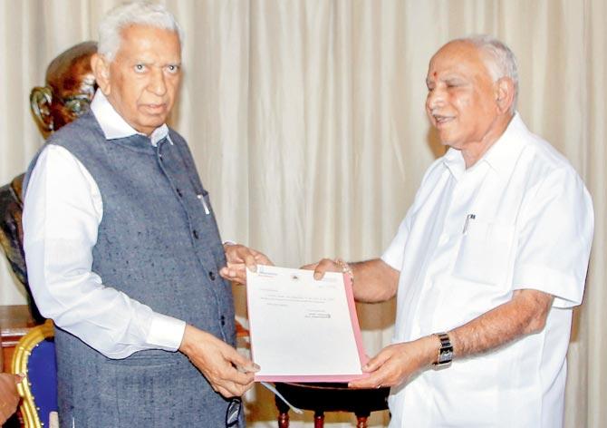BS Yeddyurappa submits his resignation as Karnataka chief minister to Governor Vajubhai Vala in Bengaluru on Saturday. Pic/PTI